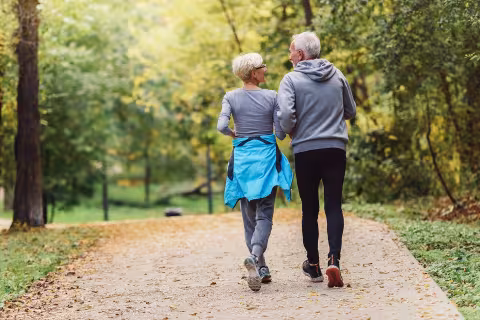 Couple walking in the woods 