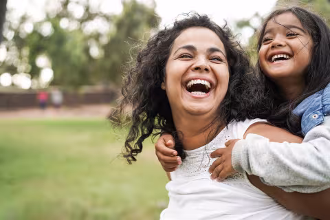 Mother & Daughter in park