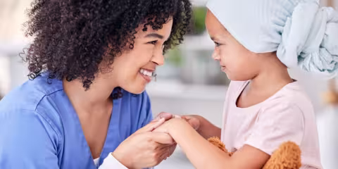 Nurse & Child holding hands